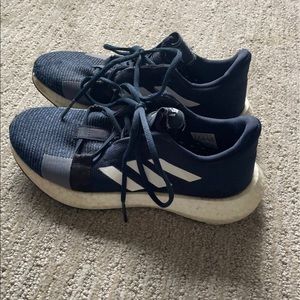 Adidas Sense boost Go shoes in navy. Running shoes.
